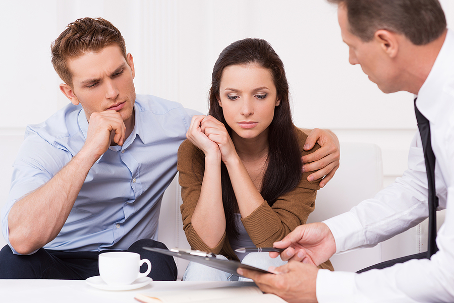estate planning lawyer with couples discussing about estate planning